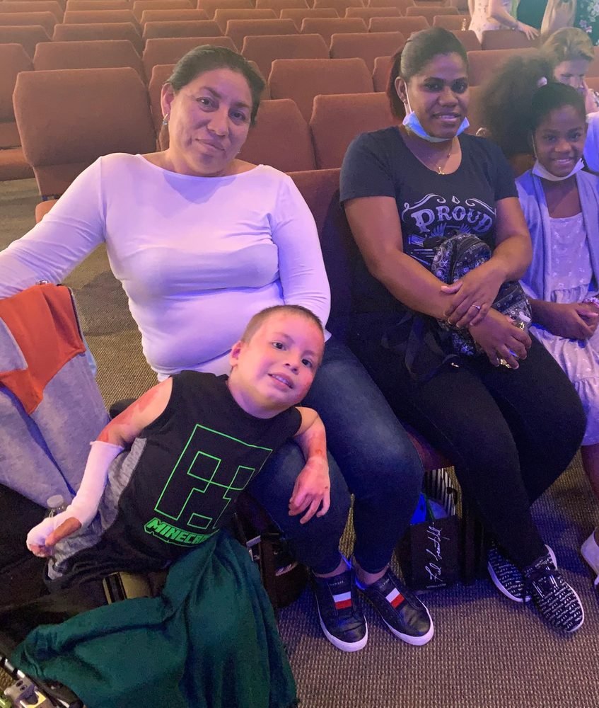 Families sharing a moment together at a community event