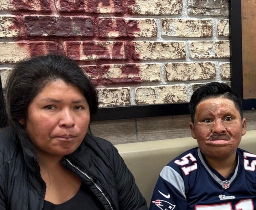 A mother and her son at a restaurant