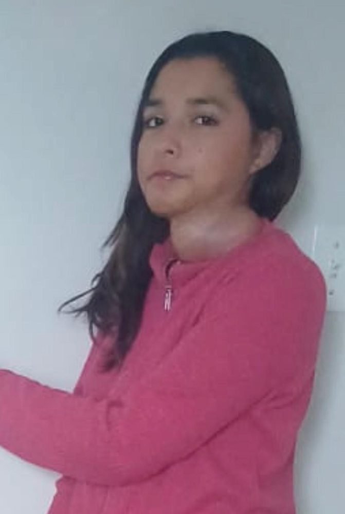 A portrait of a girl supported by Merciful Hands